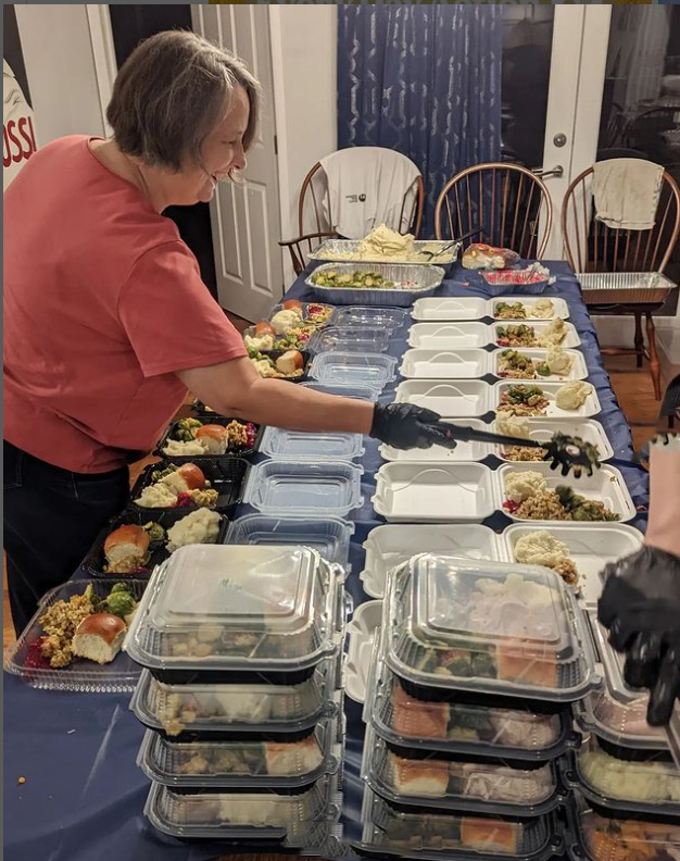 Every Day Action volunteers making Thanksgiving meals to feed the unhoused in Los Angeles, CA