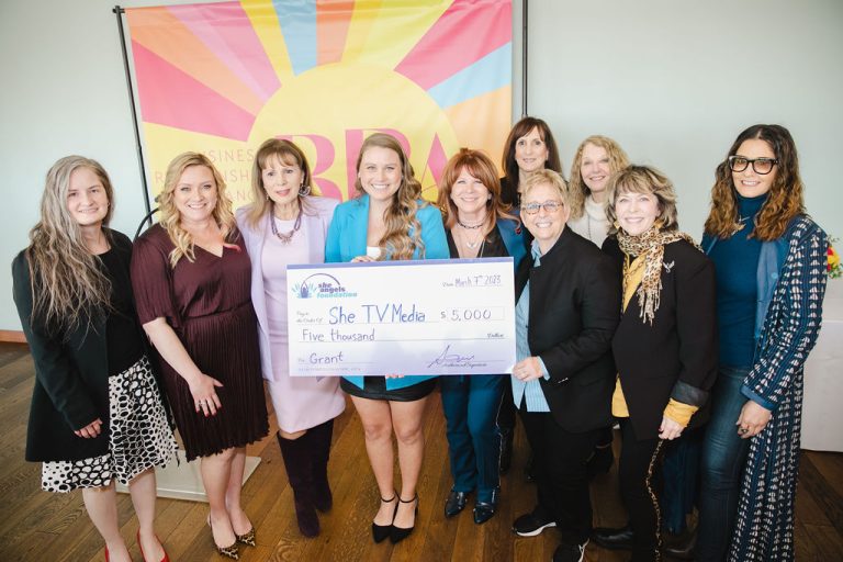 Our 2023 Women on the Rise Beneficiary receiving a $5,000 Grant from the She Angels Foundation